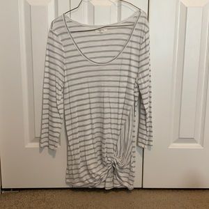White and grey stripped shirt with knot in the front, quarter length sleeves
